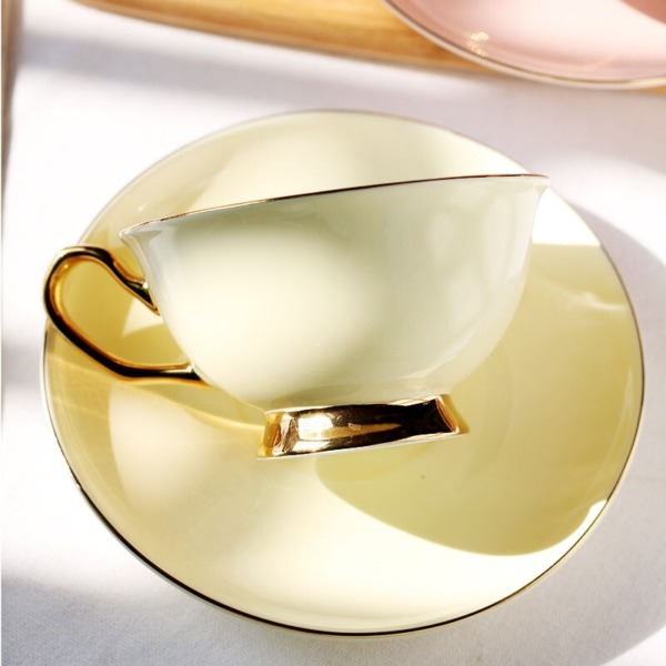 Bone Porcelain Tea Cup with Gold Handle Ceramic On-Glazed Advanced Tea Cup & Saucers Set